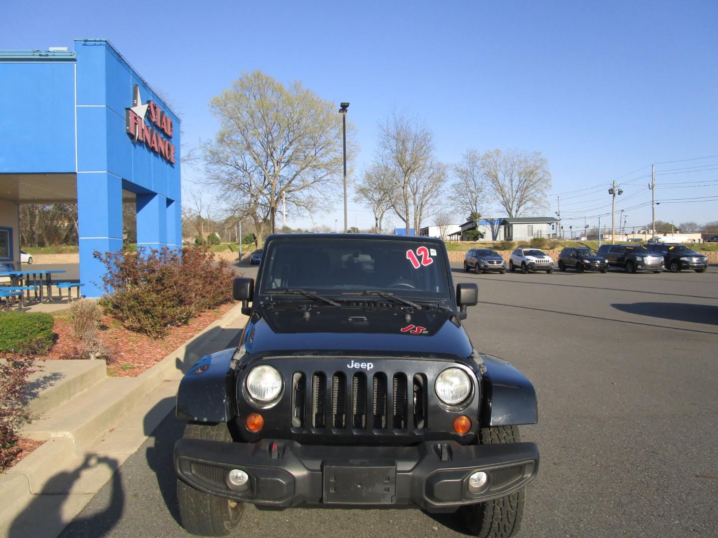 2012 BLACK /Gray / Cloth Jeep Wrangler WRANGLER UNLIMITED (1C4BJWEG8CL) with an 3.6L V6 engine, located at 1814 Albert Pike Road, Hot Springs, AR, 71913, (501) 623-1717, 34.494228, -93.094070 - ONE OWNER - Photo#1